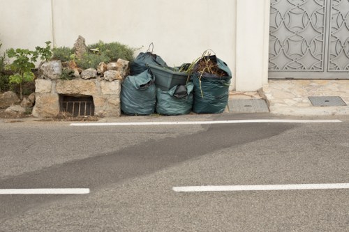 West London rubbish clearance truck transporting waste to a recycling center