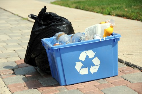 Technician handling hazardous waste safely